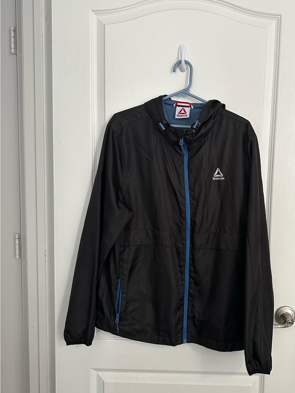 Reebok Black Windbreaker Jacket with Blue Accents
